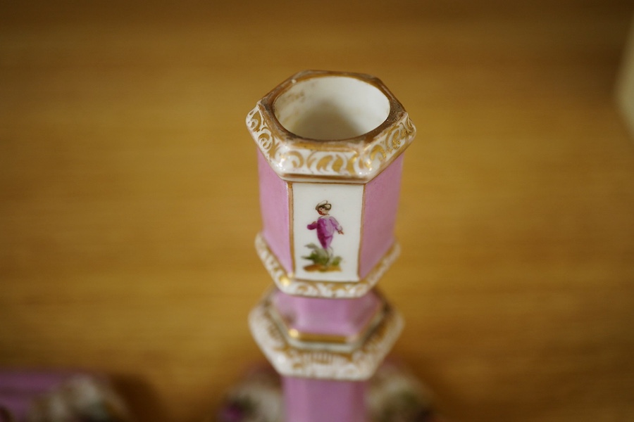 A pair of Berlin porcelain pink ground octagonal candlesticks, late 19th century, 13.5cm. Condition - worn but good